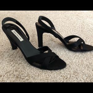 Black satin pumps